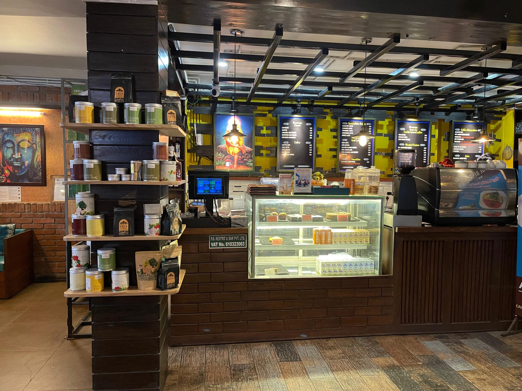 First-floor espresso bar and bakery counter at PeeDee Beans
